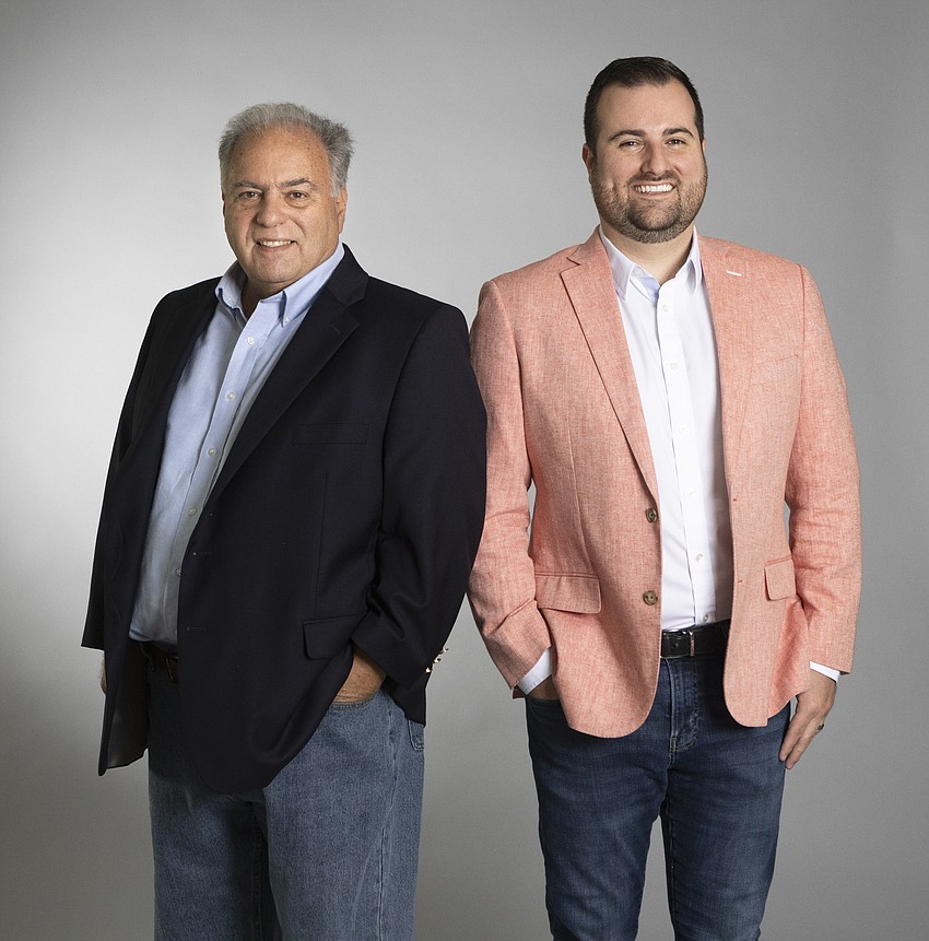 Christopher Souza with his mentor, his dad Steve Souza. Photo by Mark Wemple